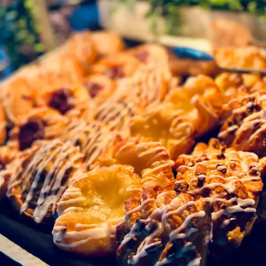 Deluxe Continental Breakfast with Assorted Sweet Breads, Mini Muffins, Danish & Bagels with Cream Cheese, Butter & Jellies & Coffee