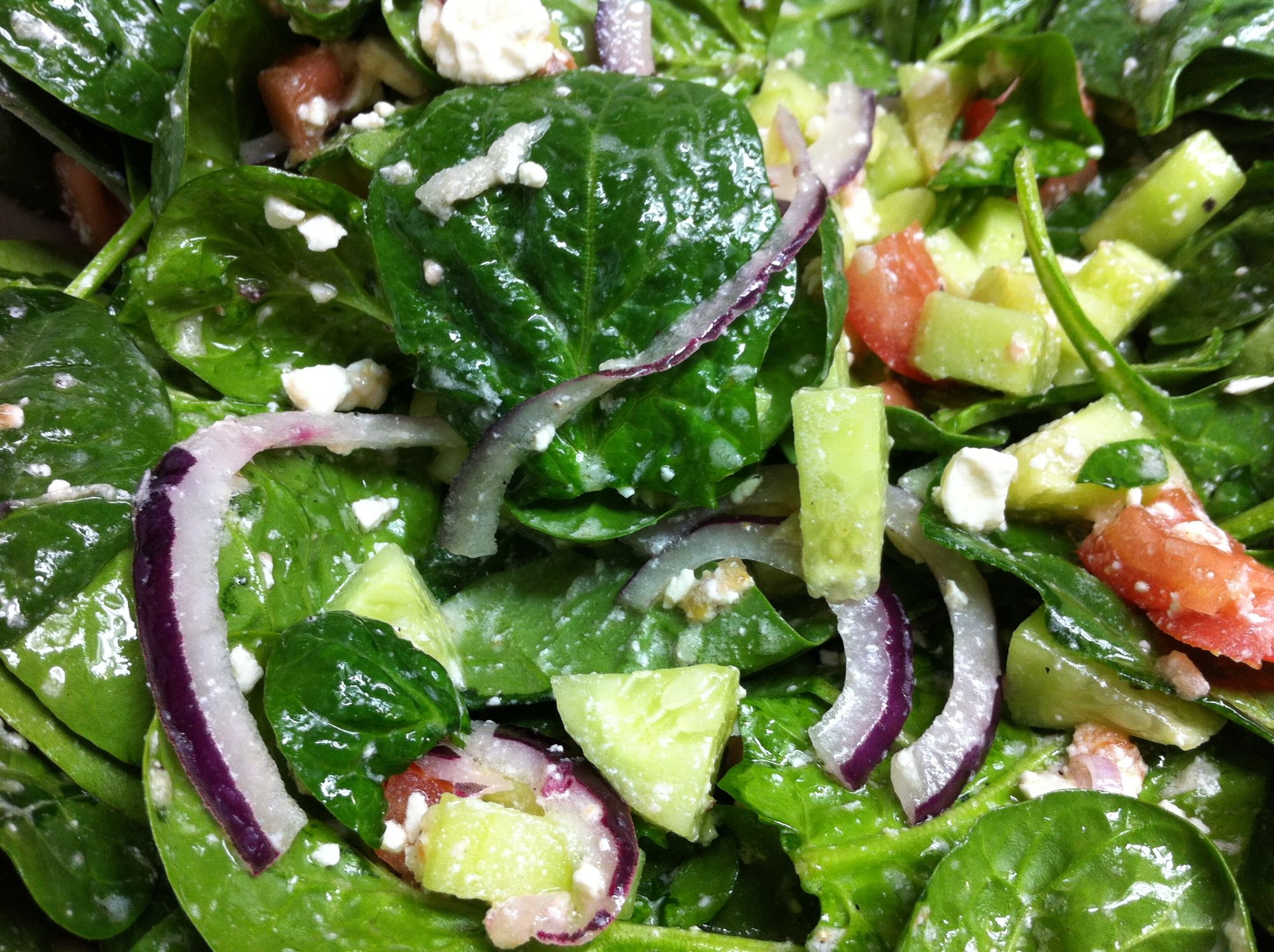 Greek spinach salad bowl