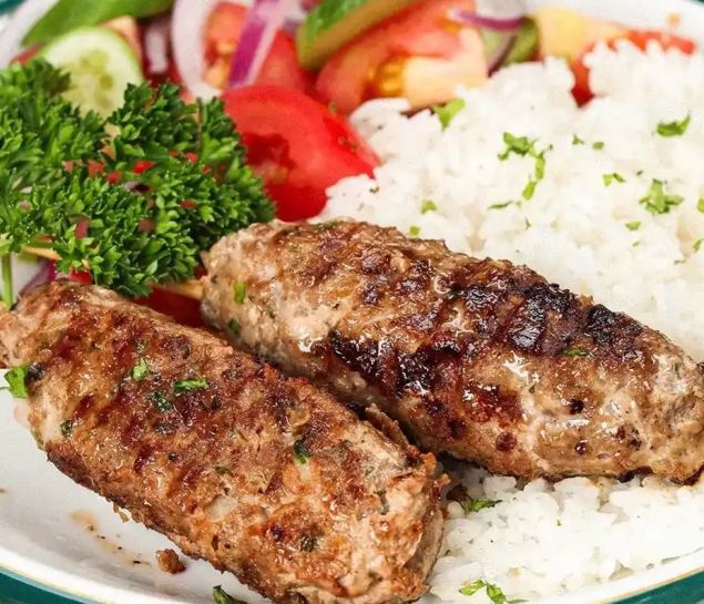 Lamb and Beef Kofta, herbed rice with lentils and Sumac roasted vegetables
