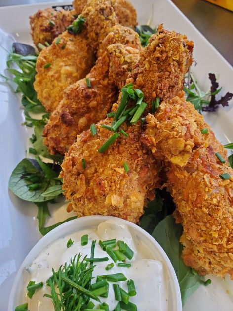 Crunchy Chicken Drumsticks with Parmasan and cayenne pepper, butter roasted and served with our homemade ranch sauce. External Inbox